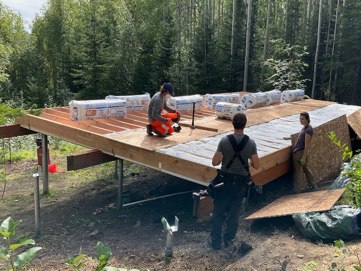 Josh, Justine and Eric
        insulating their floor